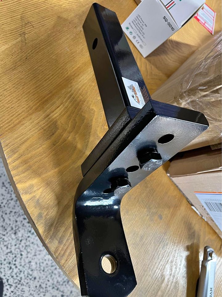 Drop down tow hitch